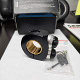 Motogadget switch shown with 2 push buttons and a silver inlay around the buttons