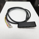 Lights with wiring for a motogadget instrument.